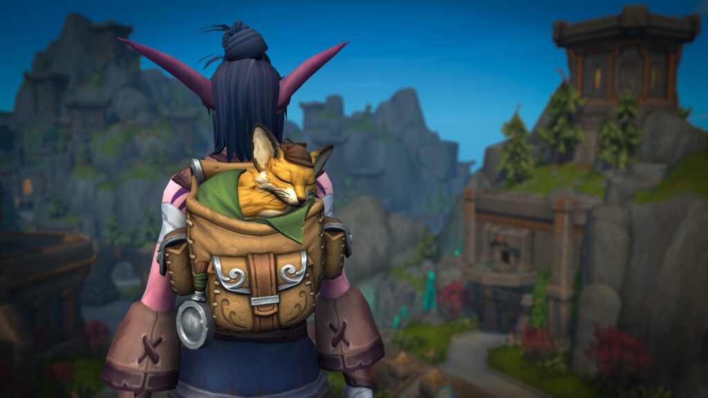 Screenshot of a World of Warcraft character carrying a fox in a backpack