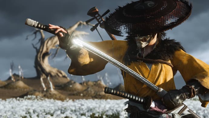 Ghost of Y&omacr;tei trailer screenshot showing samurai in yellow garb and wide hat holding a katana shimmering in sunlight