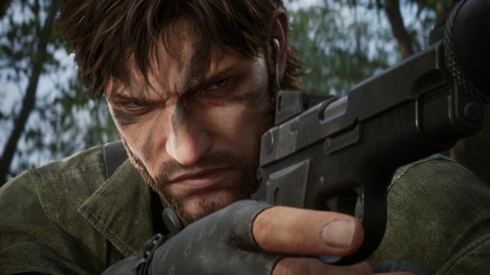 A screenshot from Metal Gear Solid Delta: Snake Eater showing a close up of Snake in camouflage paint with his finger cocked on the trigger of a pistol held in front of his face.