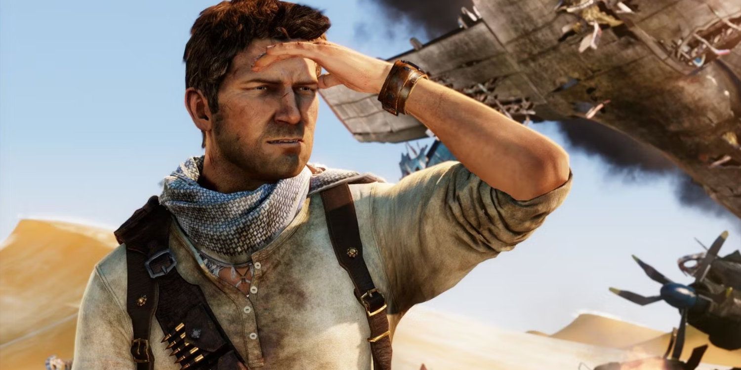 Nathan Drake looks into the distance while in a desert.