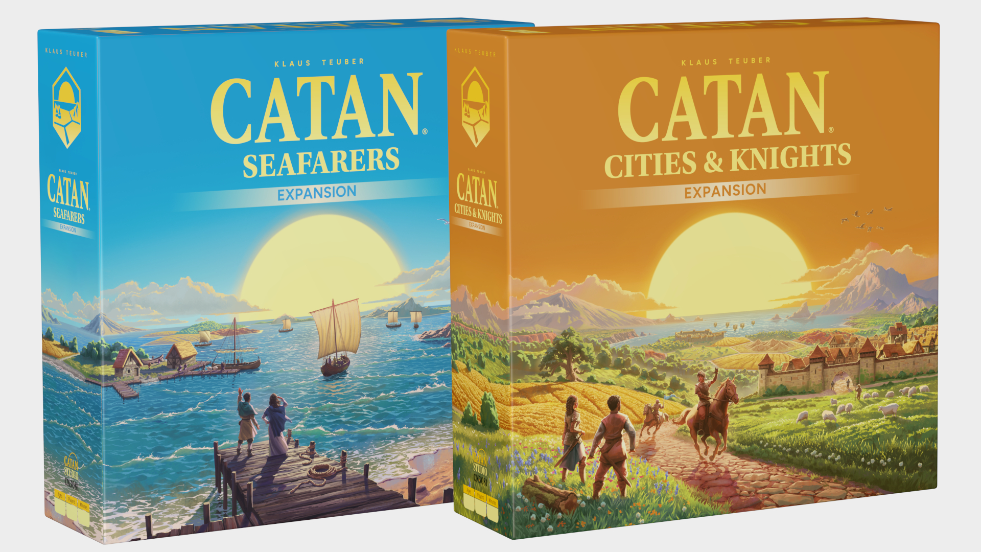 Catan expansion boxes on a plain background