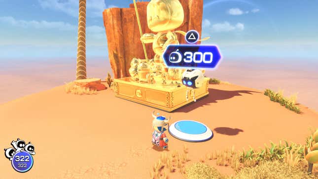 Astro Bot stands in front of a giant button and a golden statue.