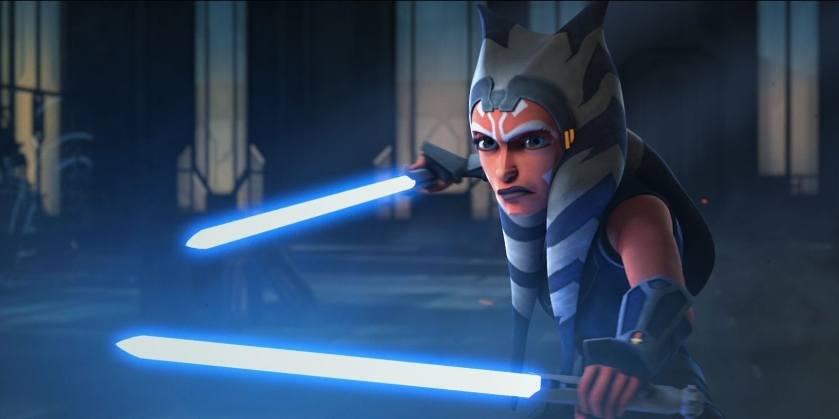 Ahsoka Tano holding two swords while looking so prepared to battle with it