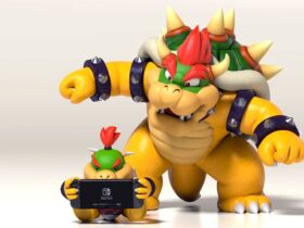 Nintendo Switch ad showing Bowser and Bowser Jr, the latter playing on a Switch while the former watches with a surprised expression on his face