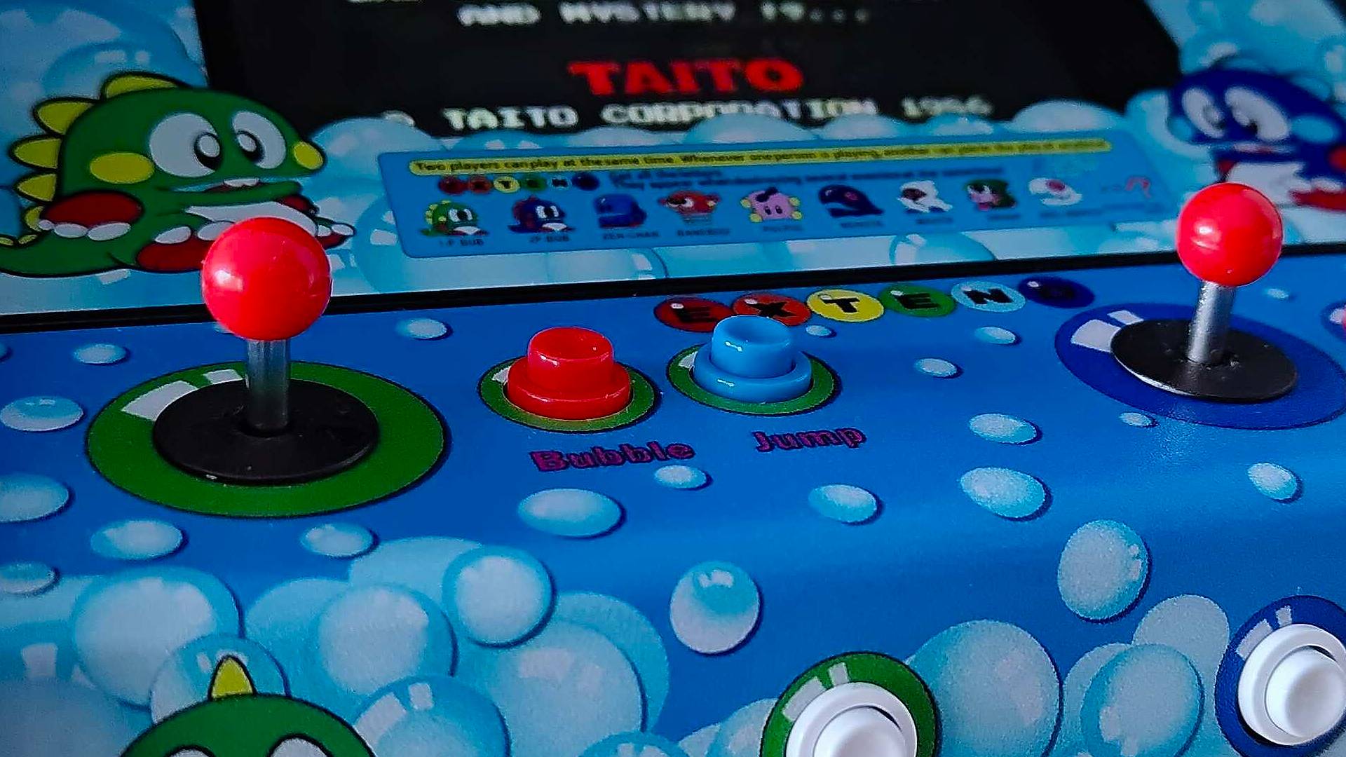 Close up of Quarter Arcade Taito Bubble Bobble arcade machine controls