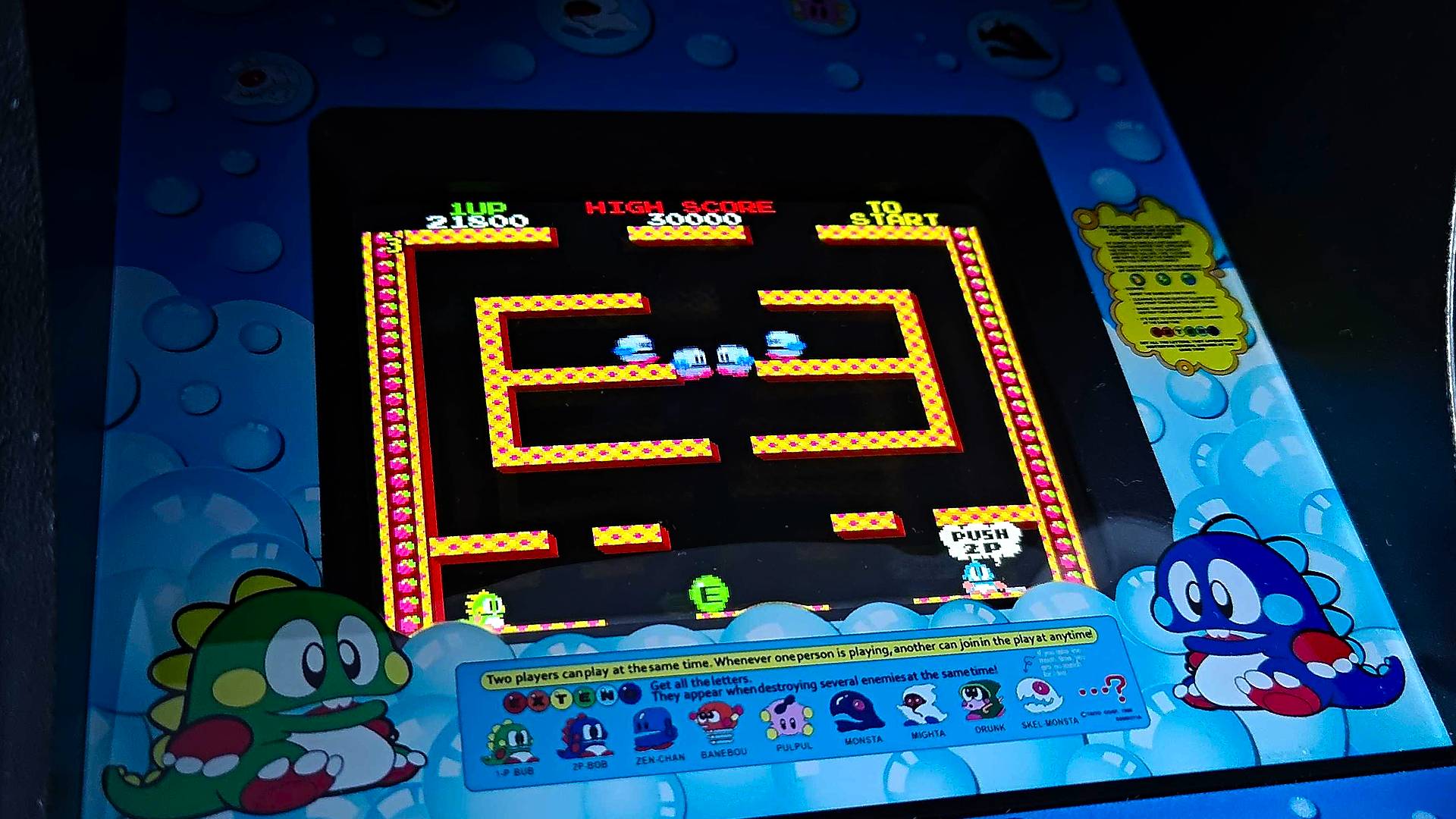 Close up of QQuarter Arcade Taito Bubble Bobble arcade machine gameplay