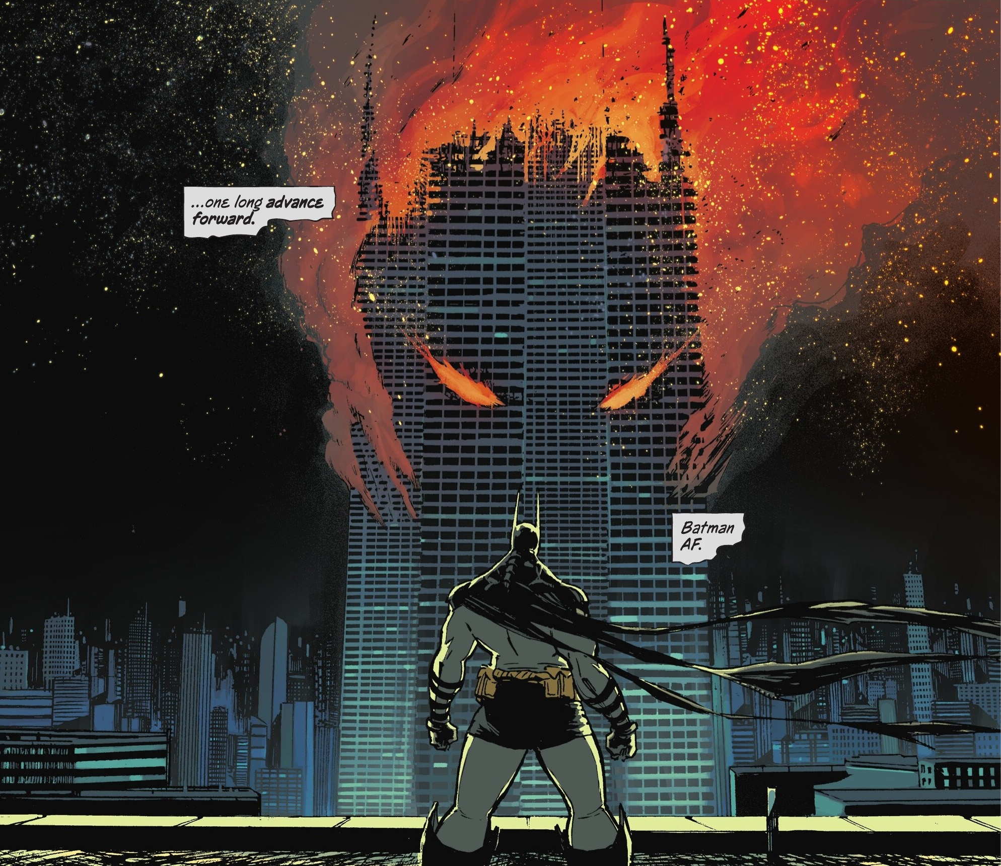 Batman stands in front of a blazing building.