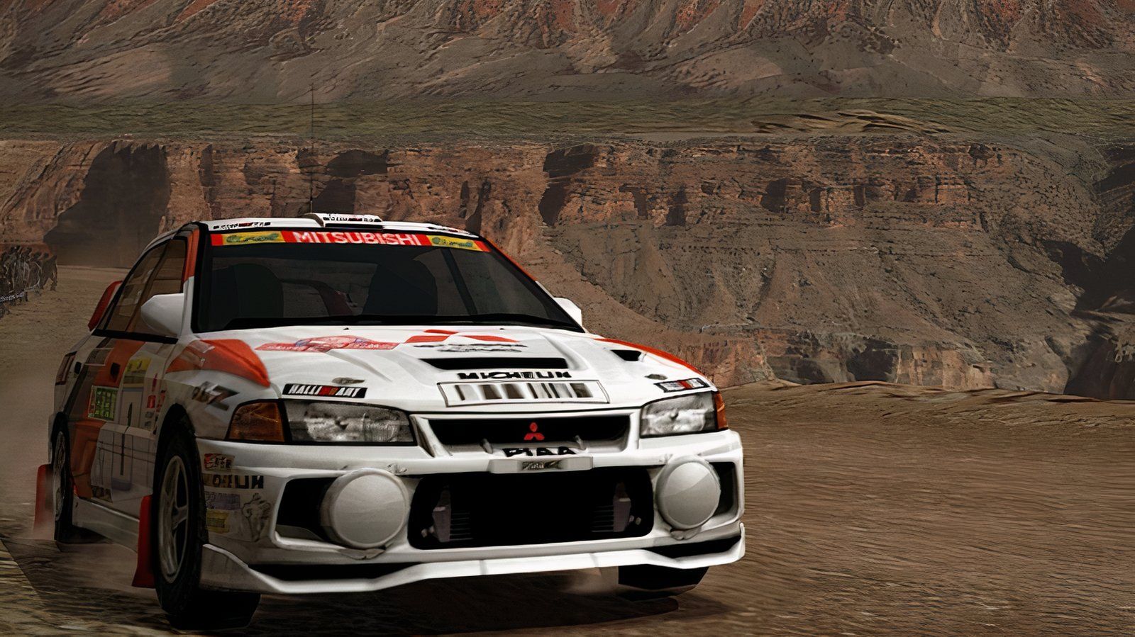 Mitsubishi racing car in racing in the desert in Gran Turismo 4.