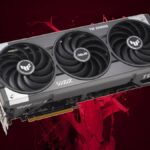 Asus Radeon RX 9070 XT TUF graphics card with red liquid in backdrop