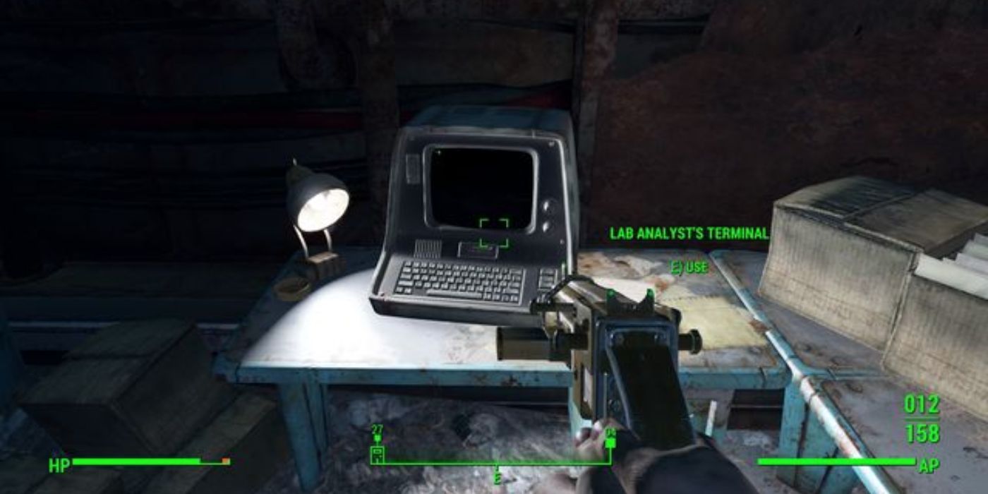 The main character approaching a Terminal with a pistol out in Fallout 4.