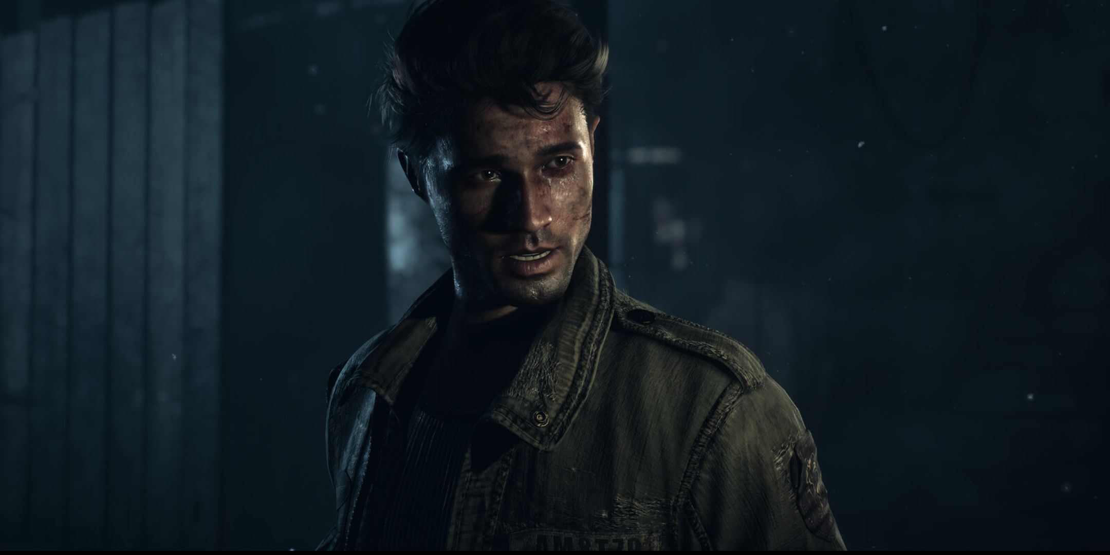 Until Dawn Remake screenshot of Mike with a muddy face.