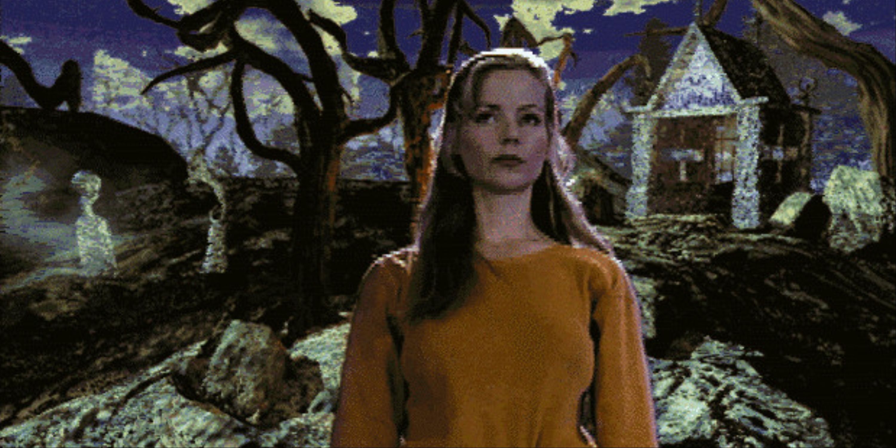 Adrienne Delaney standing in a spooky cemetery in the FMV game Phantasmagoria.