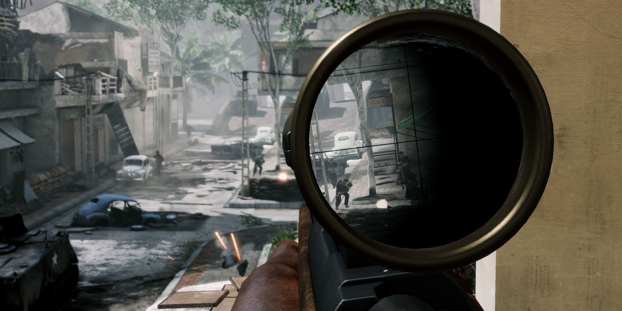 Aiming down the street as a sniper in Rising Storm 2: Vietnam.