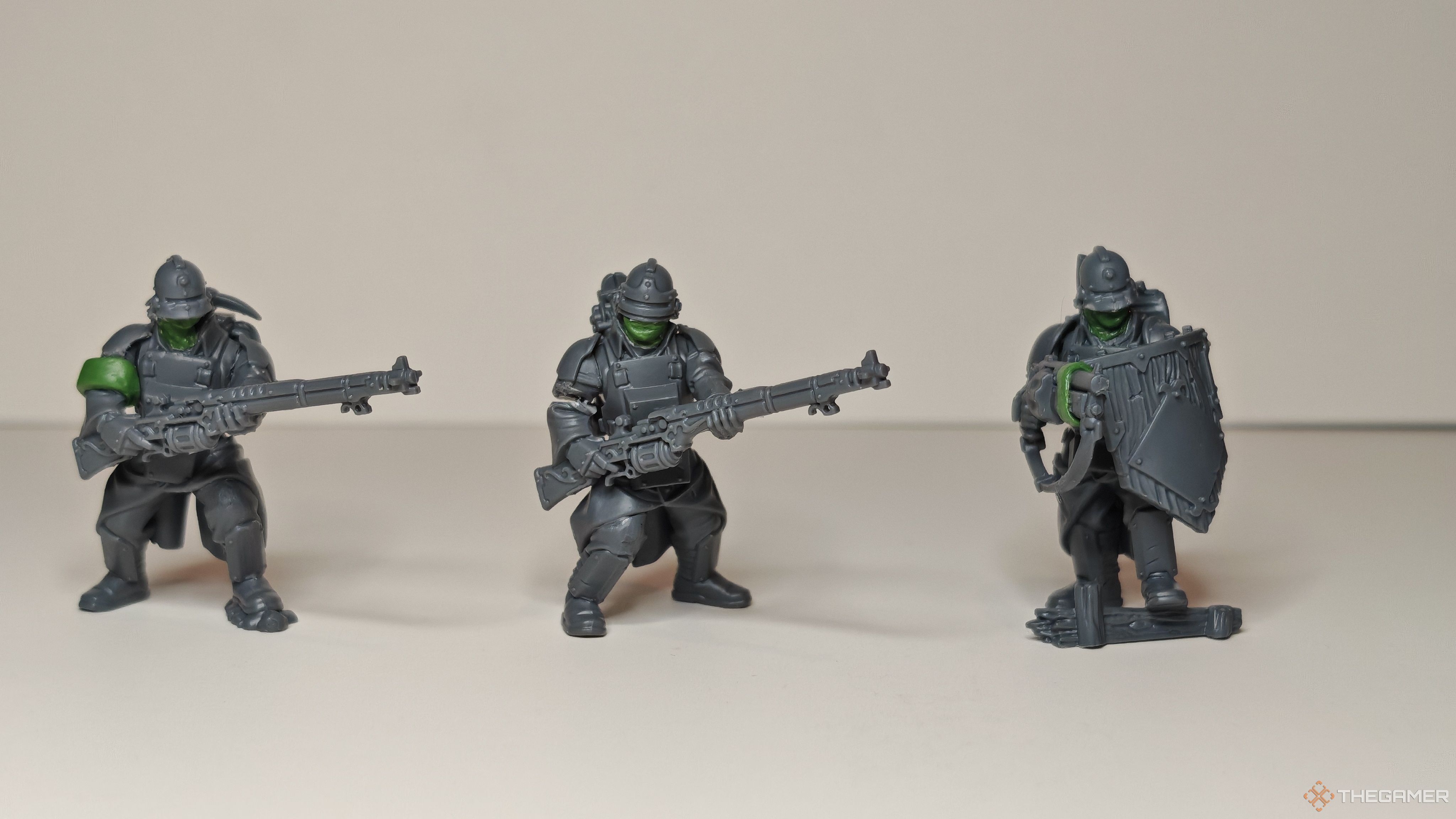 Three Trench Crusade miniatures for New Antioch converted from Warhammer 40K Death Korps of Krieg in front of a white background