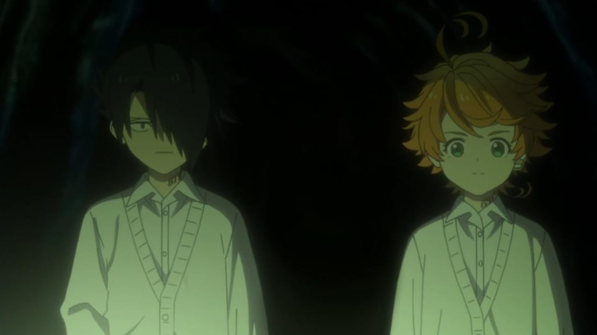 Ray and Emma in a dark place in The Promised Neverland.