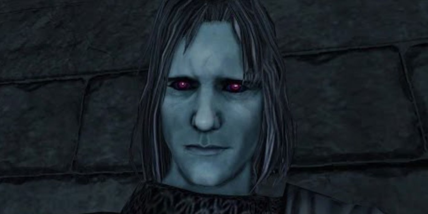 A close shot at Grave Warden Aydane's face from Dark Souls 2.