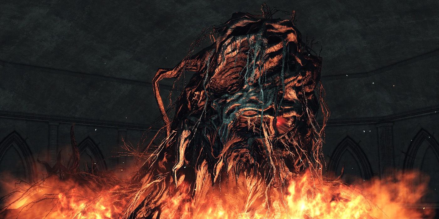 Aldia Scholar rising from a bed of fire from Dark Souls 2.