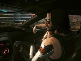 Cyberpunk 2077 screenshot showing Johnny Silverhand sitting the passenger seat of V's car