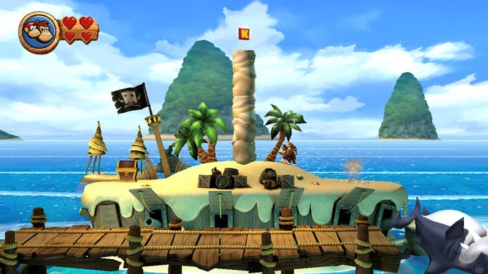 Donkey Kong explores a background layer of a beach level to obtain a K letter in Donkey Kong Country Returns HD.