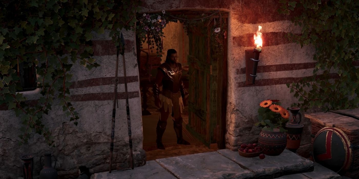 Alexios stands alone in a doorframe to the outside.