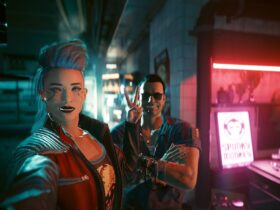 Cyberpunk 2077 screenshot of female V taking a selfie with Viktor Vektor in his cyberware shop