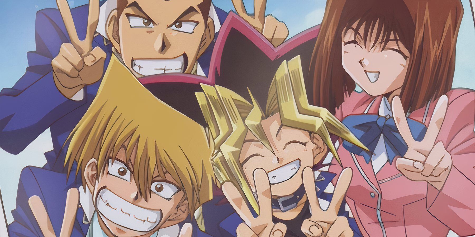 Joey, Yugi, Tea and Tristan posing and smiling