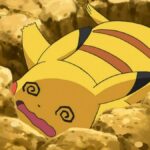 Pikachu fainted, looking worn out on the ground in the Pokemon anime.