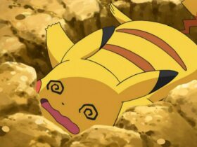 Pikachu fainted, looking worn out on the ground in the Pokemon anime.