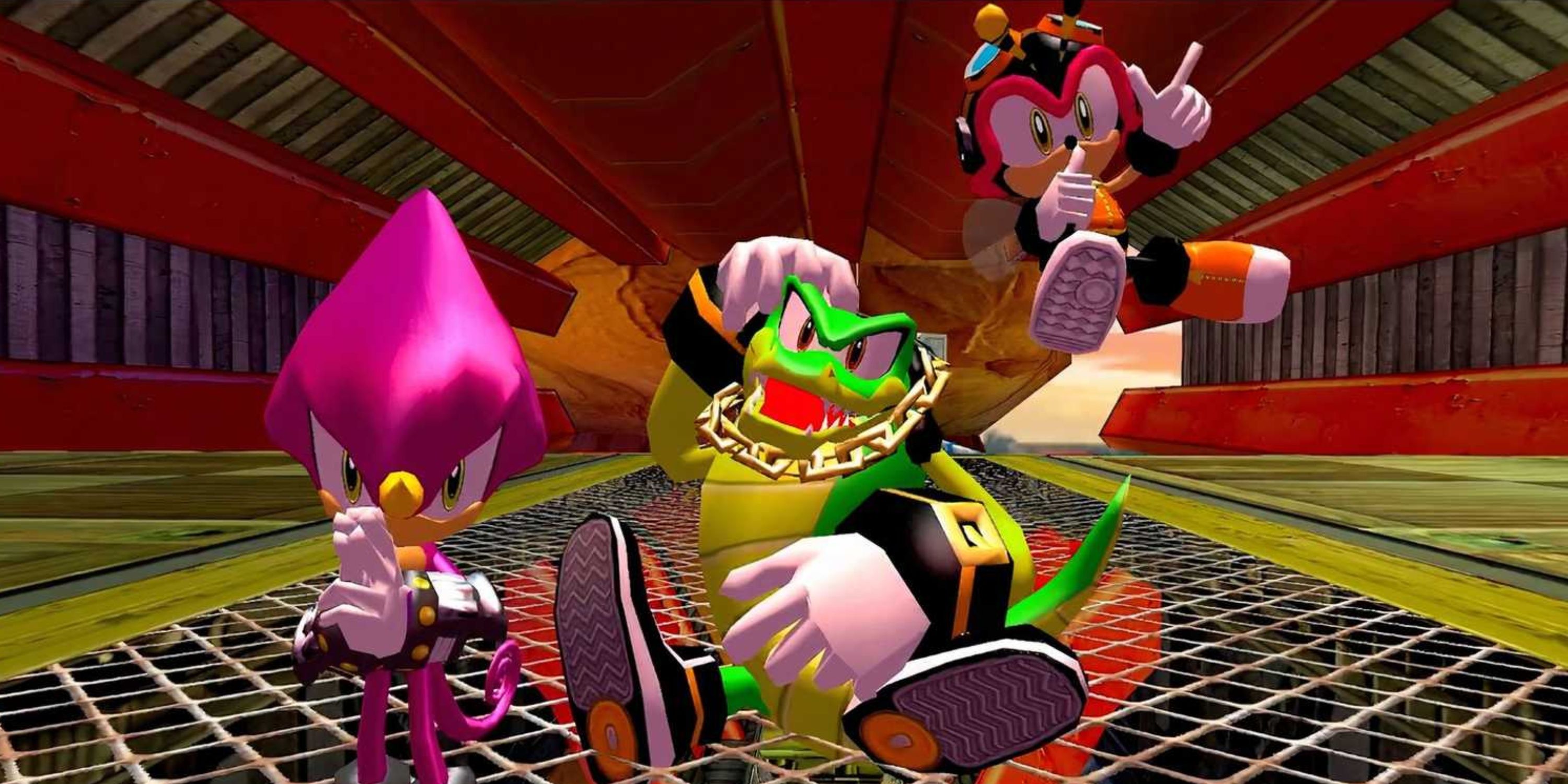 Espio, Vector, and Charmy of Team Chaotix completing the Bullet Station stage in Sonic Heroes.