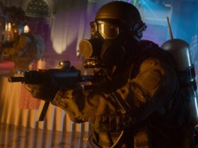 A player wearing a gasmask and holding a gun during the shooter, Call of Duty: Black Ops 6.