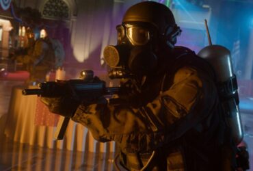 A player wearing a gasmask and holding a gun during the shooter, Call of Duty: Black Ops 6.