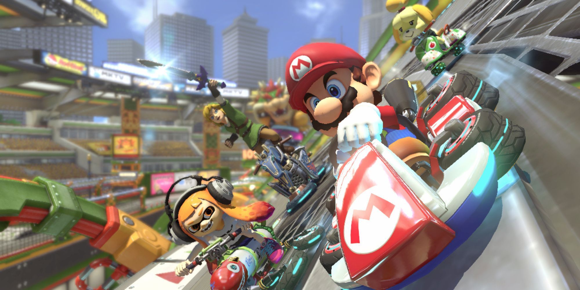 Mario driving alongside Inkling Girl, Link and Isabelle.