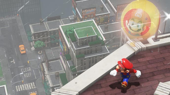 Mario is high up on a skyscraper ledge looking down at the city in Super Mario Odyssey - a balloon with his face floats above him