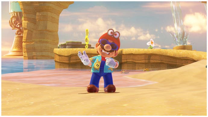 Mario stands on the beach in shades and a Hawaiian shirt in Super Mario Odyssey