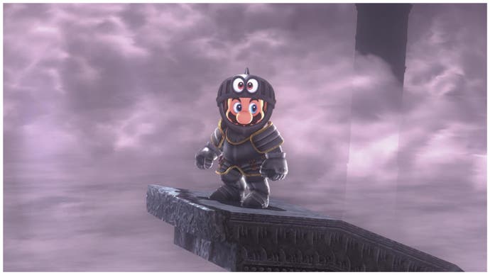 Mario dressed in armour at a foggy precipice in Super Mario Odyssey