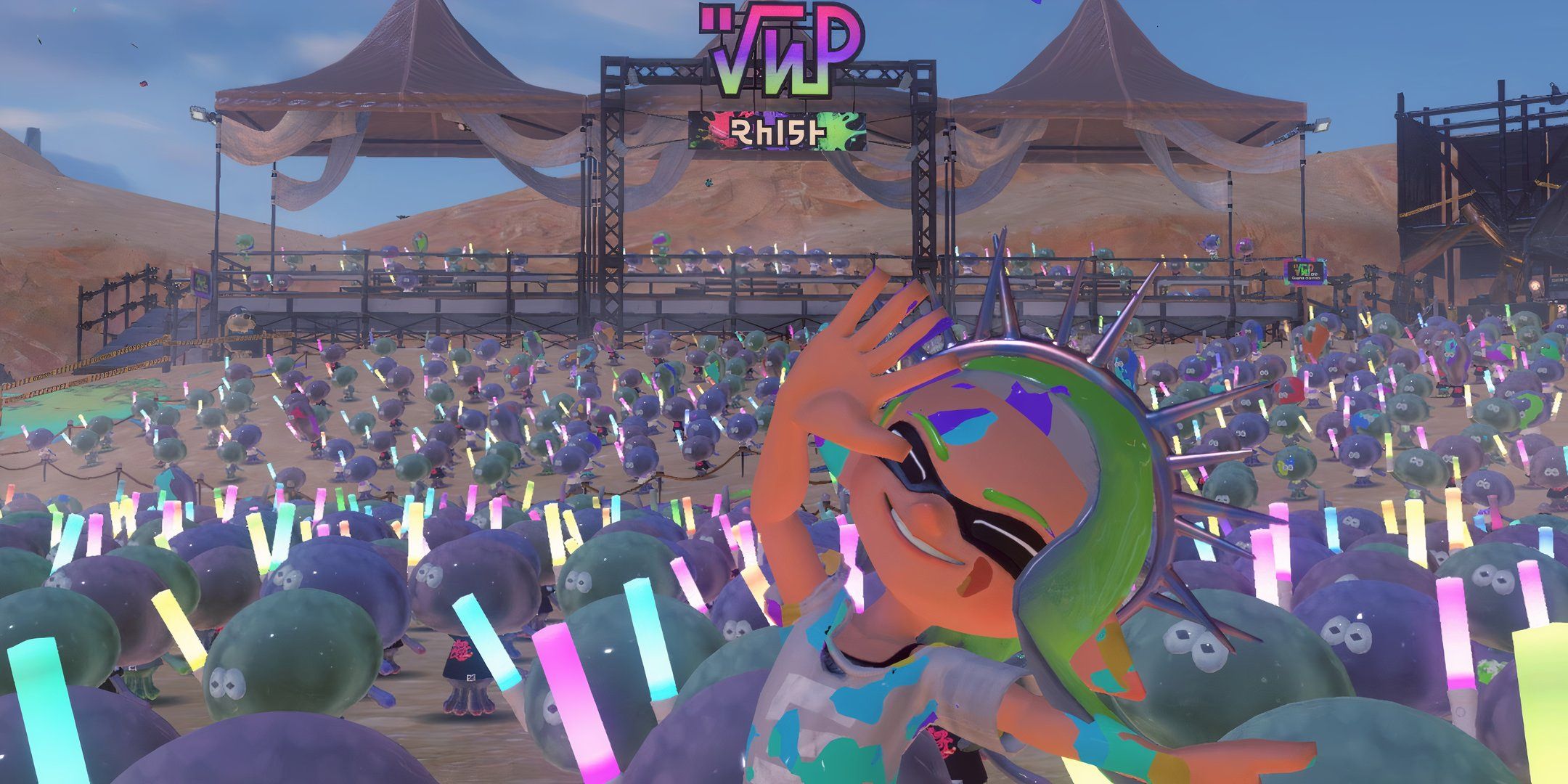 An Inkling Covered In Rainbow Ink In A Massive Crowd Of Jellyfish At The Grand Festival Venue In Splatoon 3.