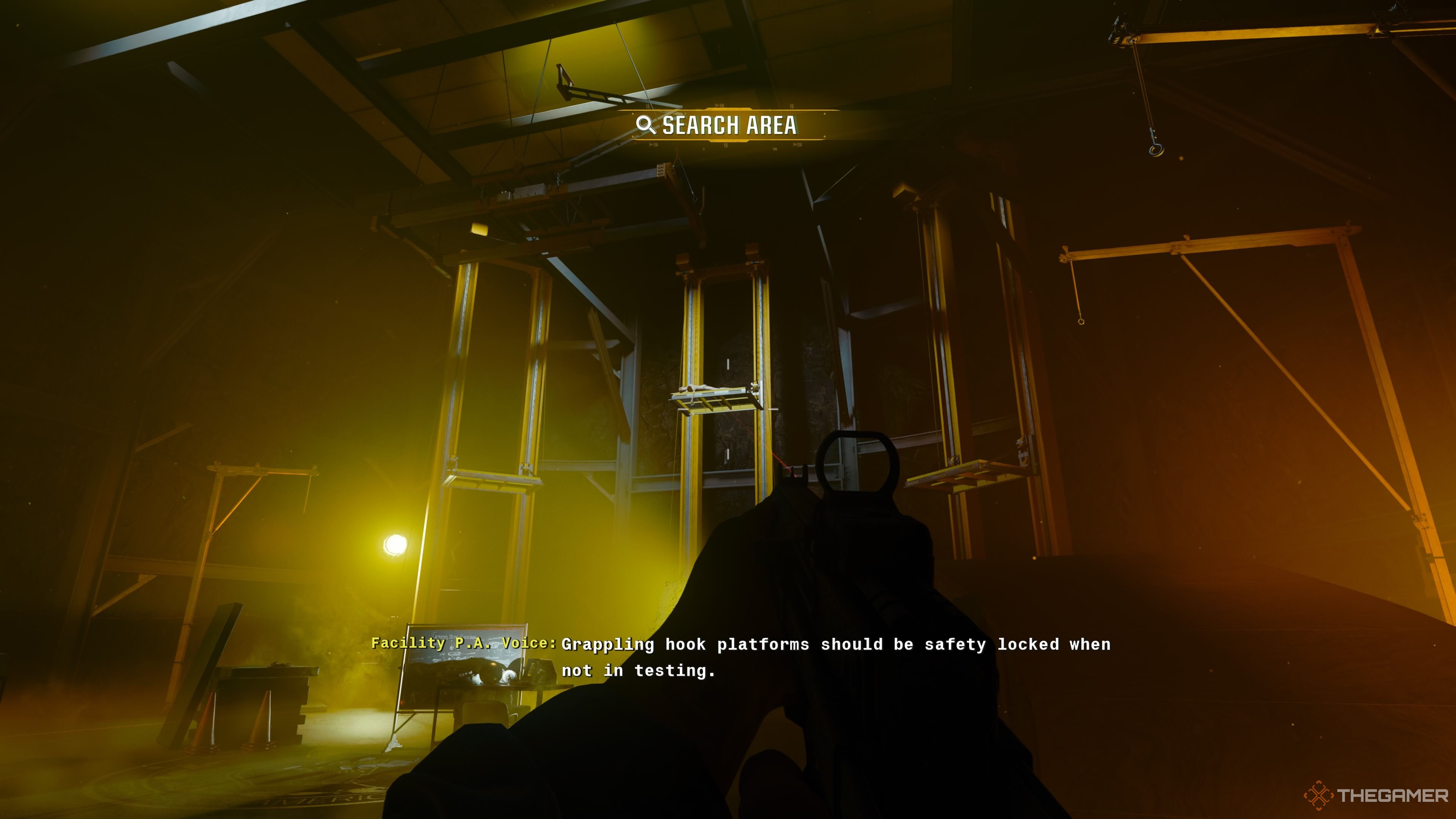 The keycard in the ACR department is hanging from a mannequin on a raised platform. The player is looking up at it with their weapon drawn within the search area.