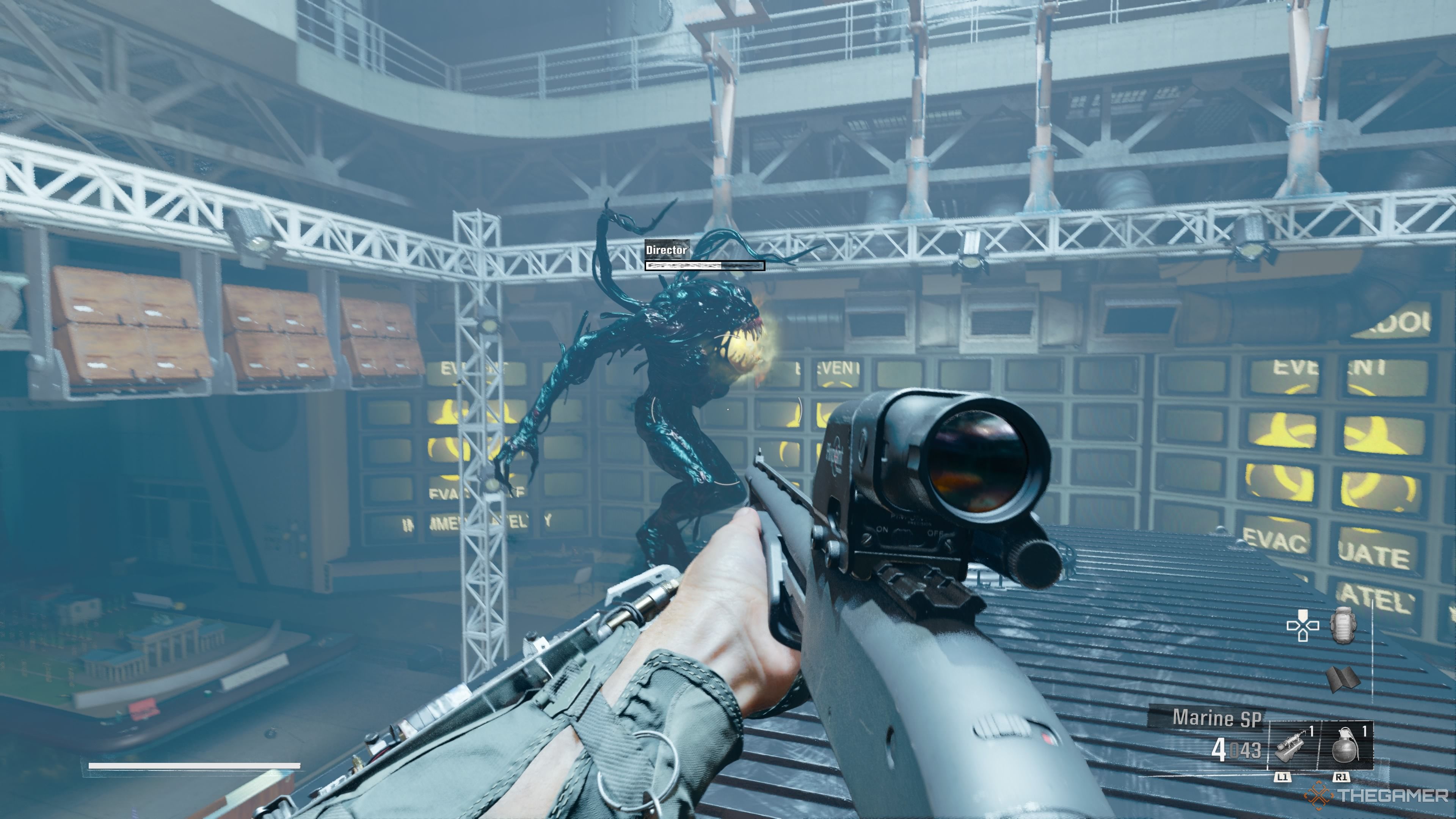 The Joint Projects Director is seen on the screen in this image and the player is wielding a shotgun while battling the Director on top of the Moscow replica container.