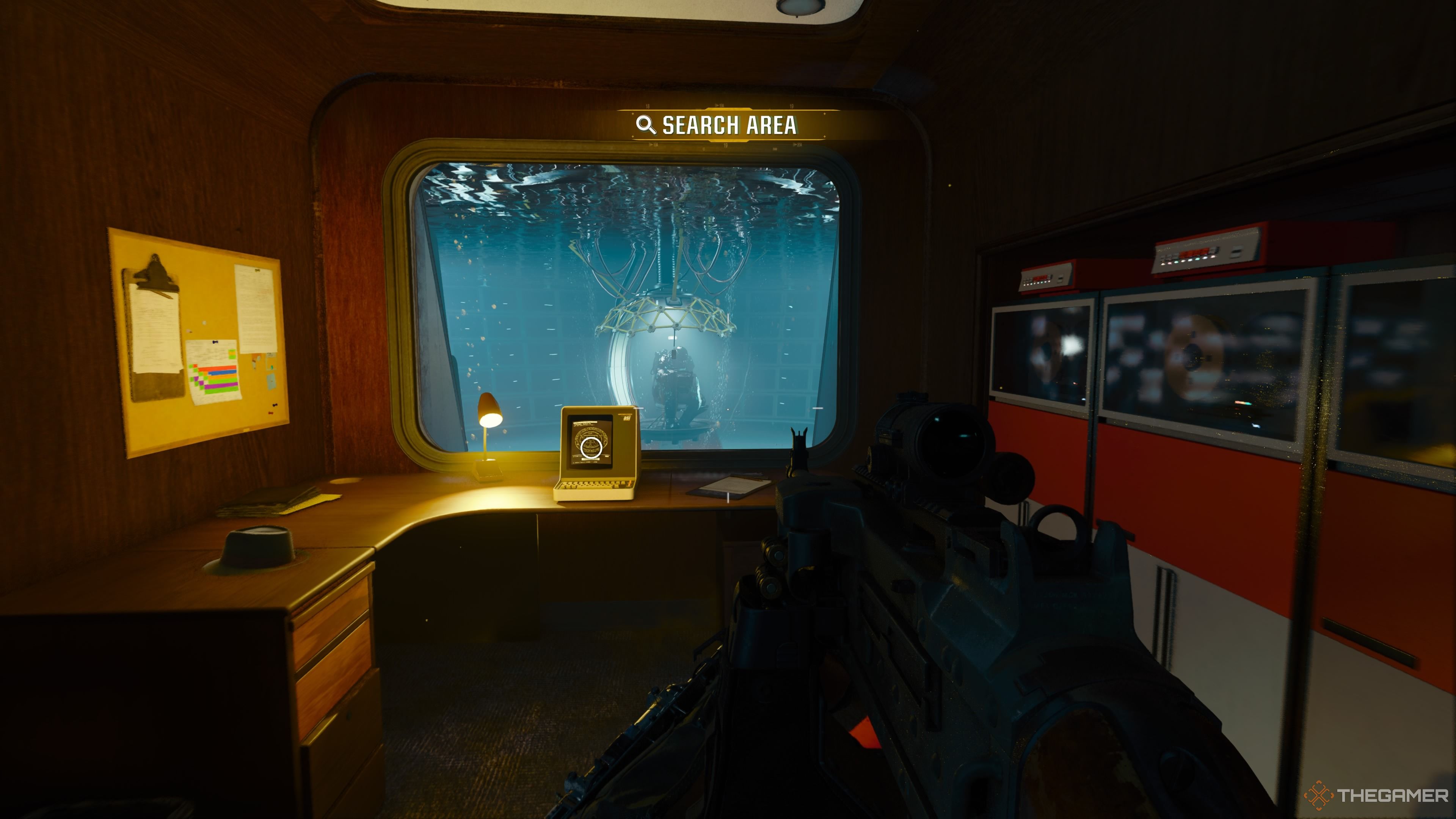 An image of the Cognitive Research area. There is a bathysphere visible in the background and a terminal on the desk for the player to interact with.