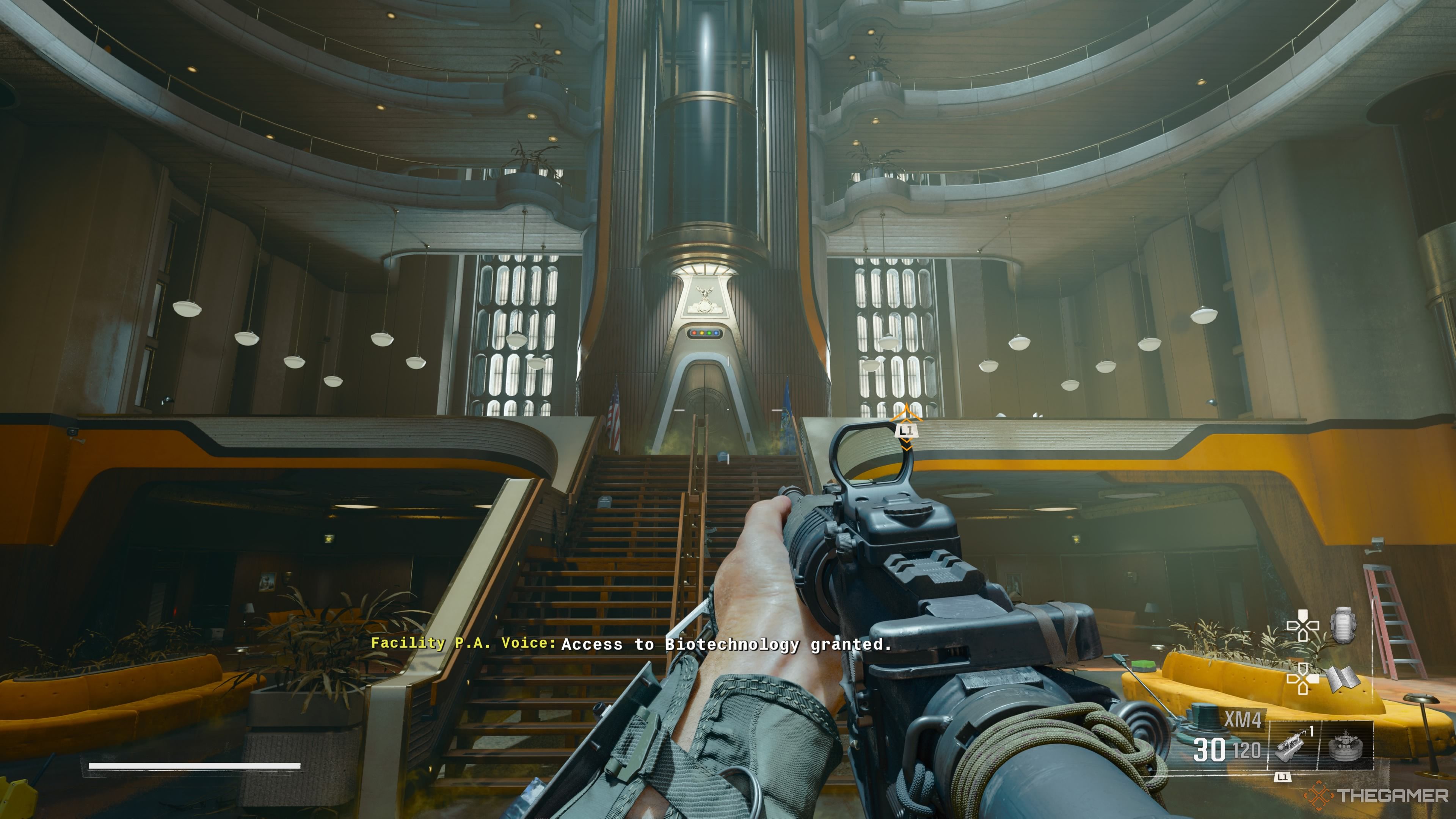 An image with the player looking up towards the Biotechnology Elevator. There are lit up buttons above the elevator indicating the four Director keycards recently placed into the slots by the player.