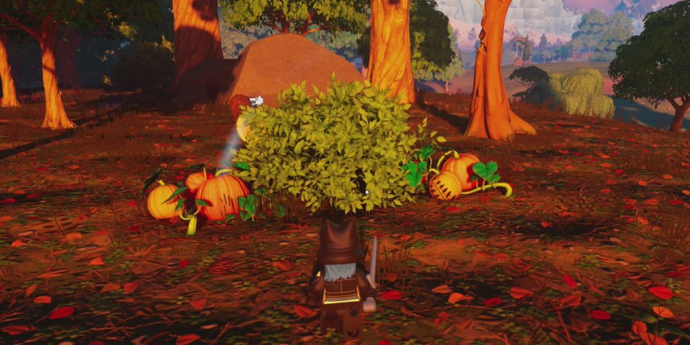 Lego Fortnite Odyssey: Standing in front of a bush with pumpkins on either side.