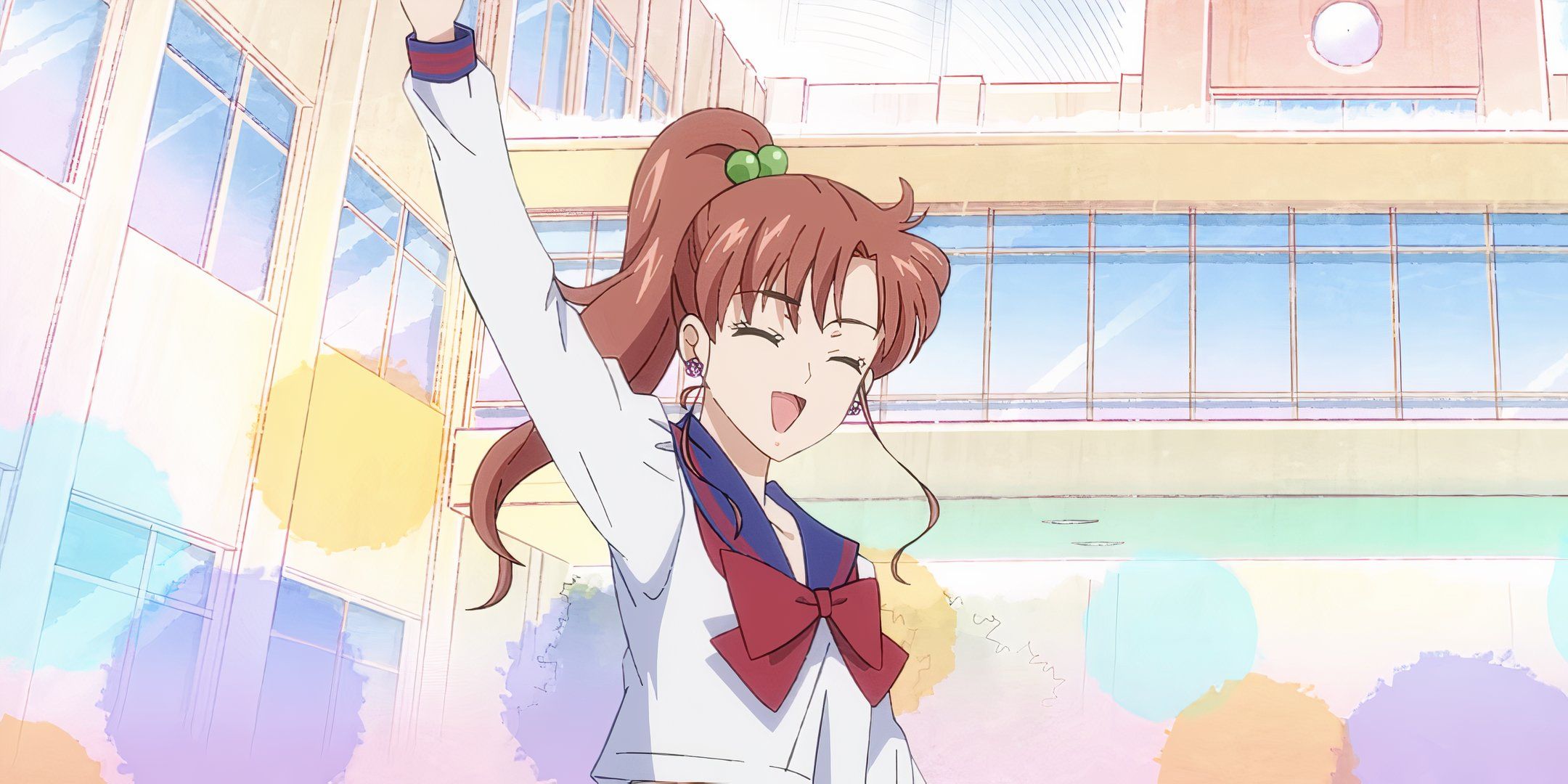 Screenshot of Sailor Jupiter waving her hand with the school in her background.