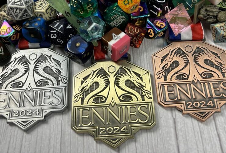 ENNIEs badges beside a dragons hoard of dice