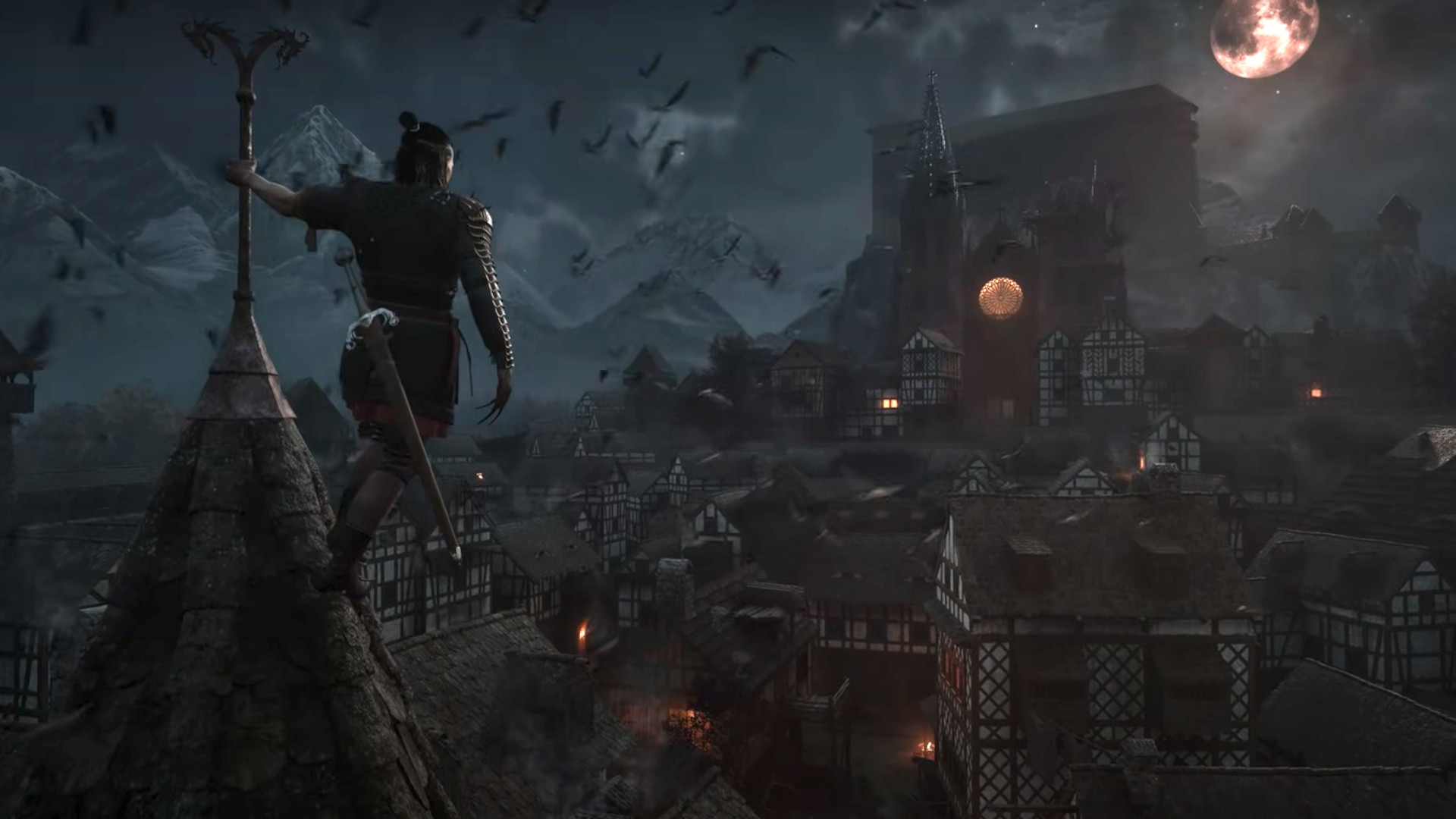 Coen looking over the village at night during the trailer for The Blood of Dawnwalker.