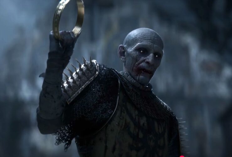 The Blood of Dawnwalker: A screenshot of the vampire Brencis holding up a crown during the trailer for the upcoming game.