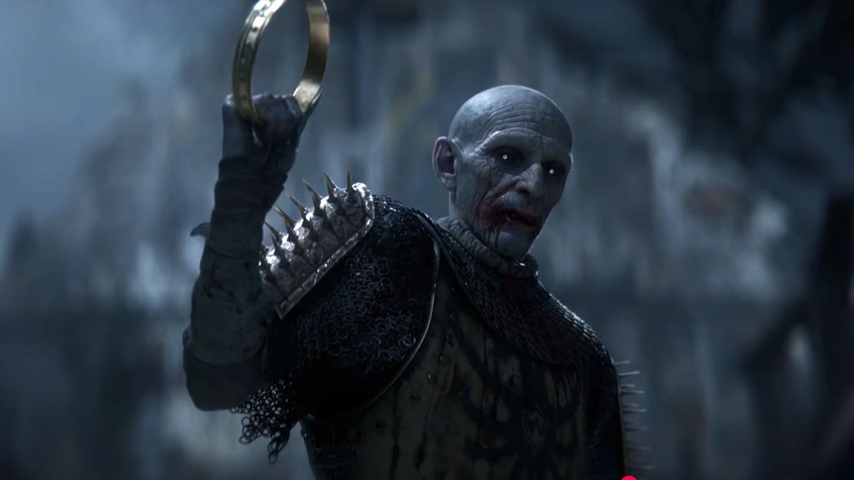 The Blood of Dawnwalker: A screenshot of the vampire Brencis holding up a crown during the trailer for the upcoming game.