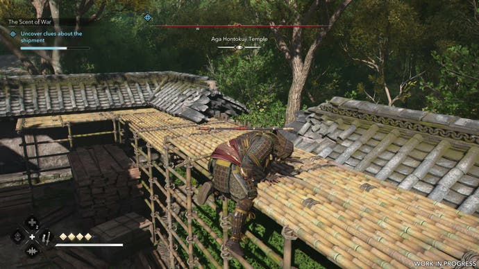 Yasuke hauls himself up over the edge of some bamboo scaffolding in Assassin's Creed Shadows.