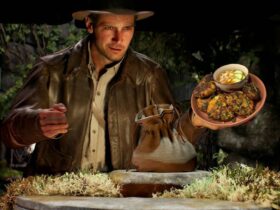 Indiana Jones and the Great Circle Indy holding Thai fishcake dish in temple