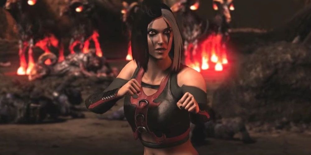 Mortal Kombat, Sareena in a fighting pose against a hellish background.