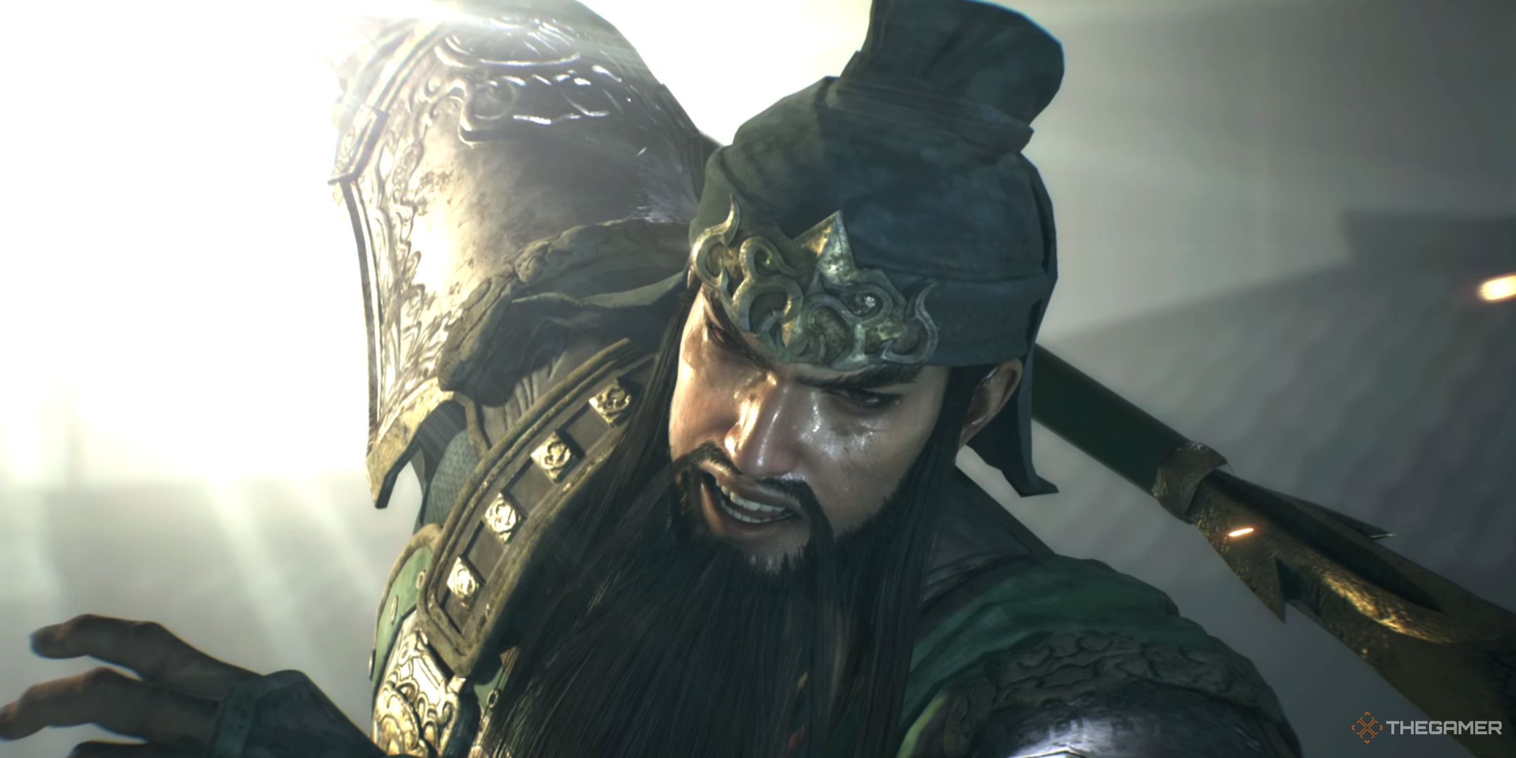 an extreme closeup of guan yu in battle in dynasty warriors: origins.